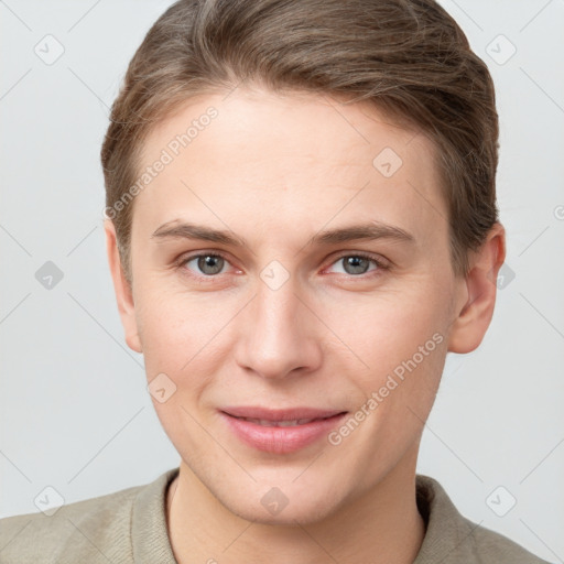 Joyful white young-adult female with short  brown hair and grey eyes