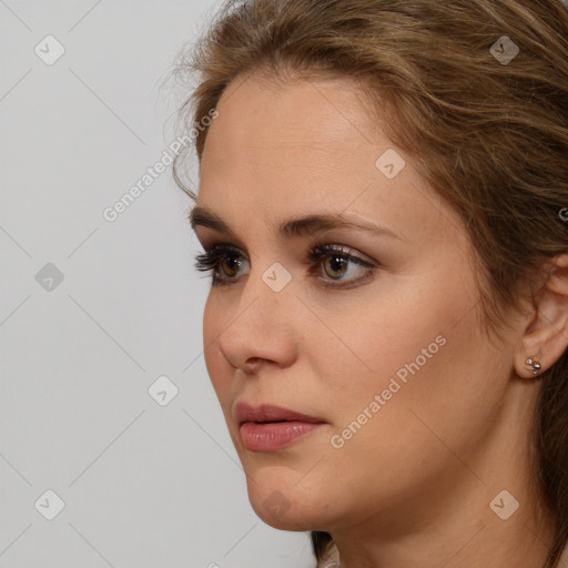 Neutral white young-adult female with long  brown hair and brown eyes