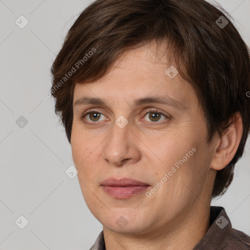 Joyful white adult female with short  brown hair and brown eyes