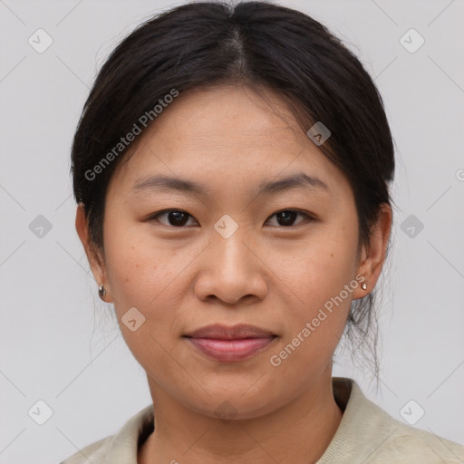 Joyful asian young-adult female with short  brown hair and brown eyes