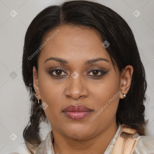 Joyful latino adult female with medium  brown hair and brown eyes