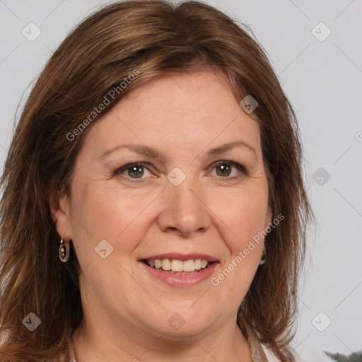 Joyful white adult female with medium  brown hair and brown eyes