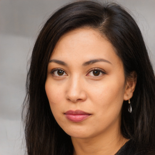 Neutral asian young-adult female with long  brown hair and brown eyes