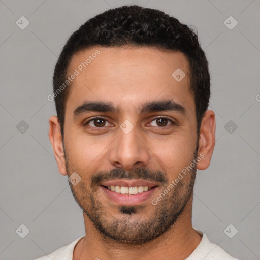 Joyful white young-adult male with short  black hair and brown eyes