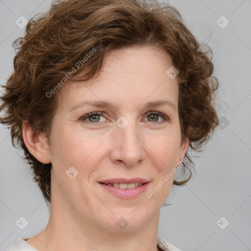 Joyful white adult female with medium  brown hair and blue eyes