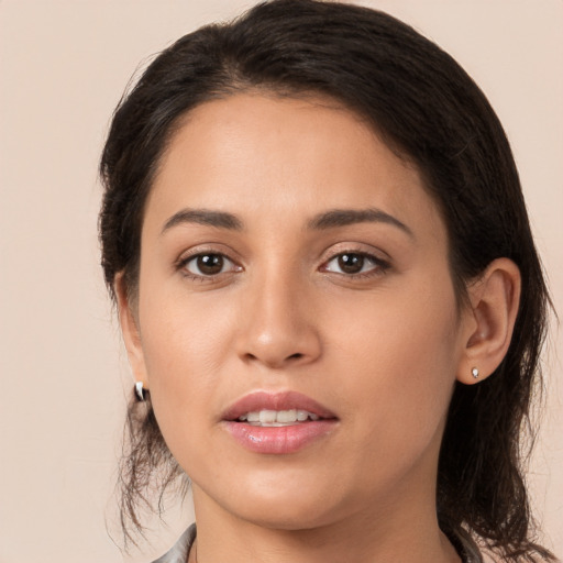 Joyful white young-adult female with medium  brown hair and brown eyes