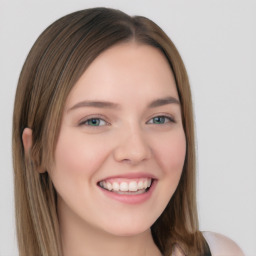 Joyful white young-adult female with long  brown hair and blue eyes