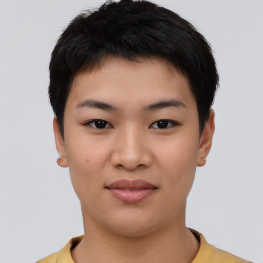Joyful asian young-adult female with short  black hair and brown eyes