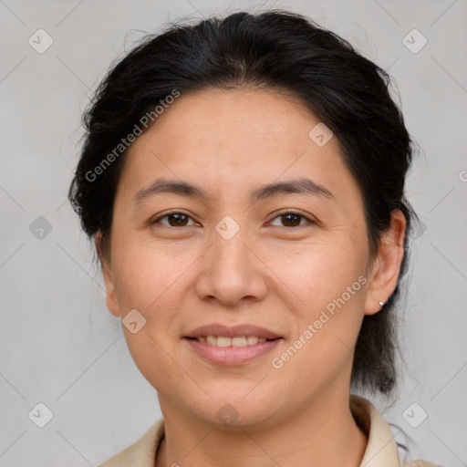 Joyful white adult female with medium  brown hair and brown eyes