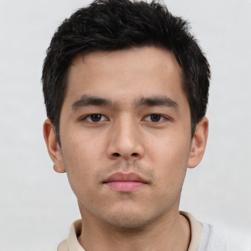 Neutral asian young-adult male with short  brown hair and brown eyes