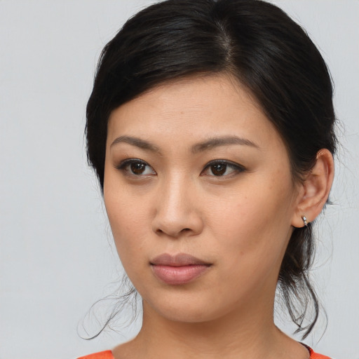 Neutral asian young-adult female with medium  brown hair and brown eyes