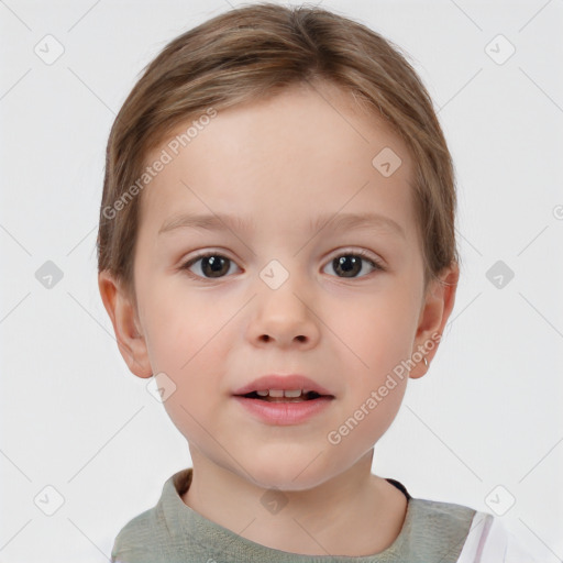 Joyful white child female with short  brown hair and brown eyes