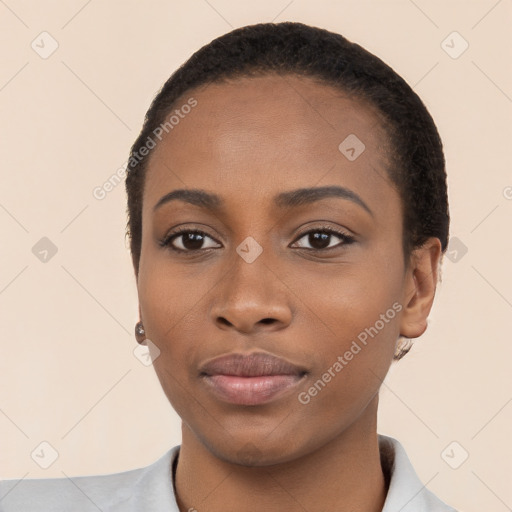 Neutral black young-adult female with short  black hair and brown eyes