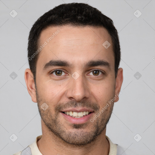 Joyful white young-adult male with short  brown hair and brown eyes