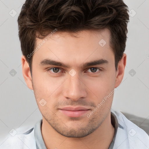 Neutral white young-adult male with short  brown hair and brown eyes