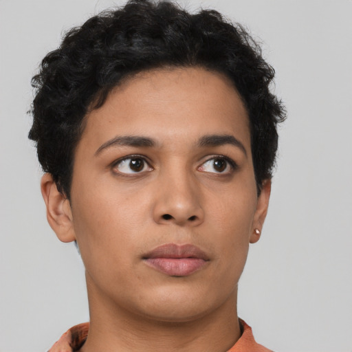 Neutral latino young-adult female with short  brown hair and brown eyes