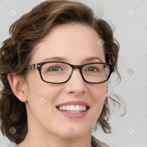 Joyful white young-adult female with medium  brown hair and blue eyes