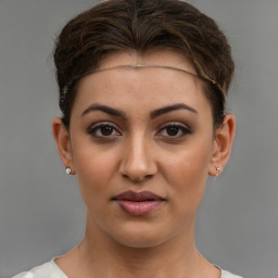 Joyful white young-adult female with short  brown hair and brown eyes