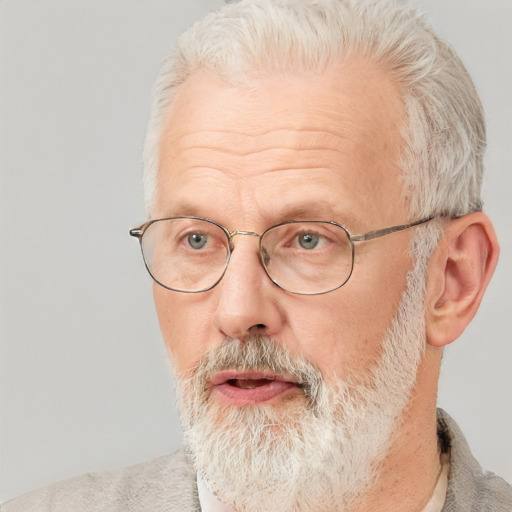 Neutral white middle-aged male with short  gray hair and blue eyes