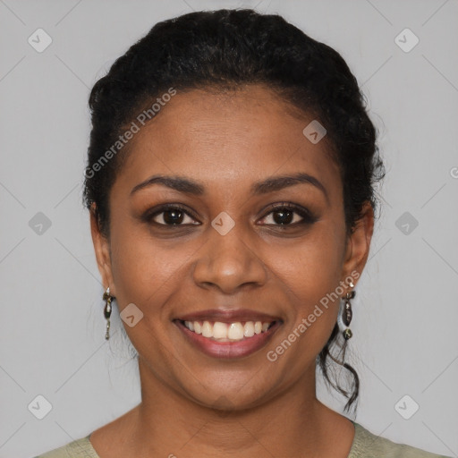 Joyful black young-adult female with short  brown hair and brown eyes