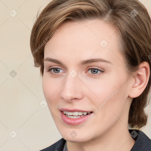 Joyful white young-adult female with medium  brown hair and grey eyes