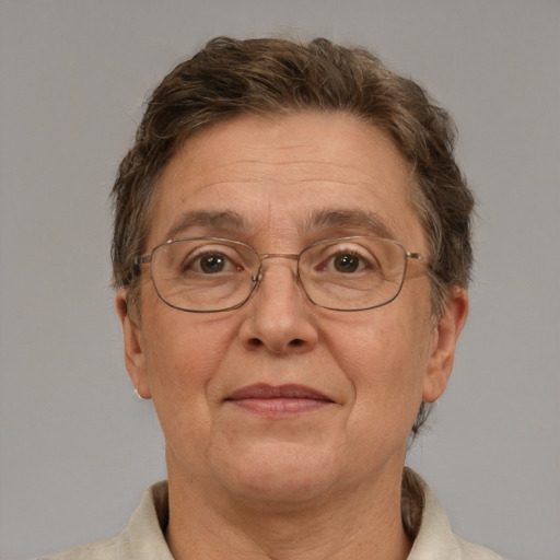 Joyful white middle-aged female with short  brown hair and brown eyes