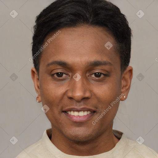 Joyful latino young-adult male with short  black hair and brown eyes