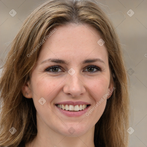 Joyful white young-adult female with long  brown hair and brown eyes