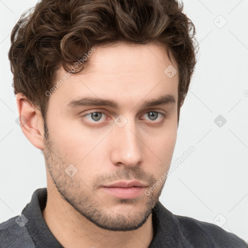 Neutral white young-adult male with short  brown hair and grey eyes