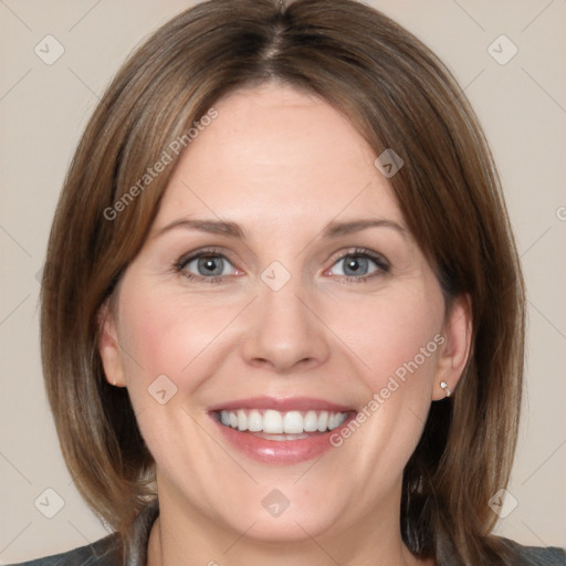 Joyful white young-adult female with medium  brown hair and blue eyes