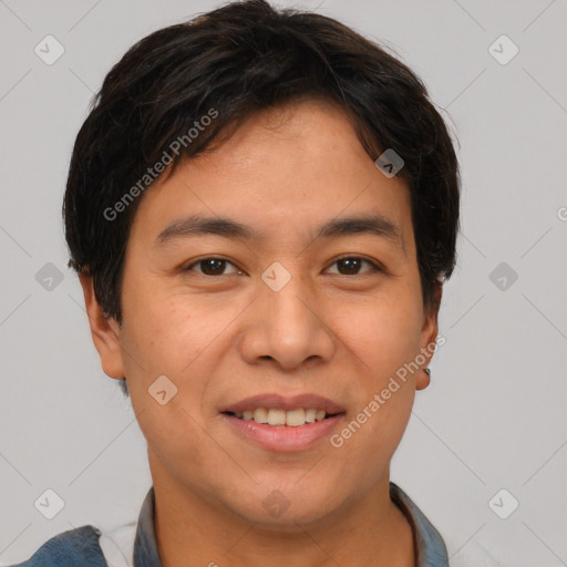 Joyful asian young-adult male with short  brown hair and brown eyes