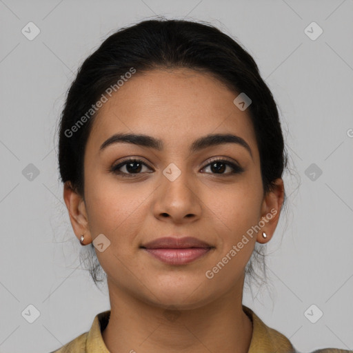 Joyful latino young-adult female with medium  brown hair and brown eyes