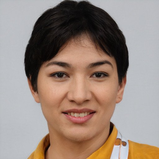 Joyful white young-adult female with short  black hair and brown eyes