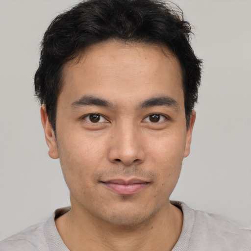 Neutral asian young-adult male with short  brown hair and brown eyes