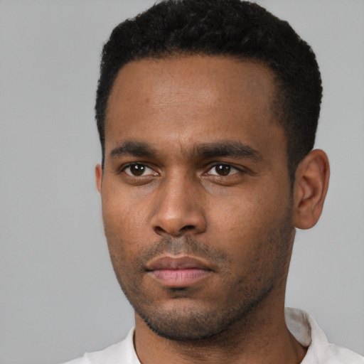 Neutral black young-adult male with short  black hair and brown eyes