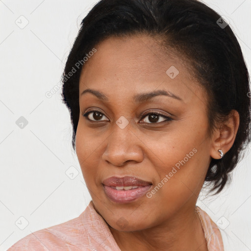 Joyful black young-adult female with medium  brown hair and brown eyes