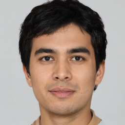 Neutral asian young-adult male with short  black hair and brown eyes