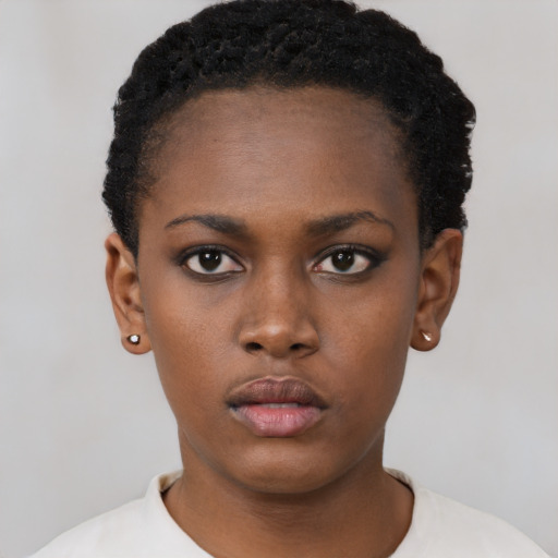 Neutral black young-adult female with short  black hair and brown eyes