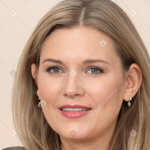 Joyful white adult female with long  brown hair and brown eyes