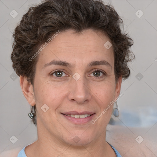 Joyful white adult female with short  brown hair and brown eyes