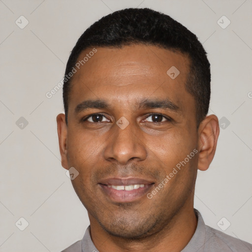 Joyful latino young-adult male with short  black hair and brown eyes