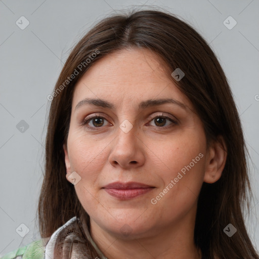 Joyful white adult female with medium  brown hair and brown eyes