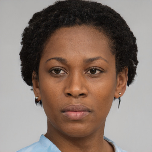 Neutral black young-adult female with short  brown hair and brown eyes
