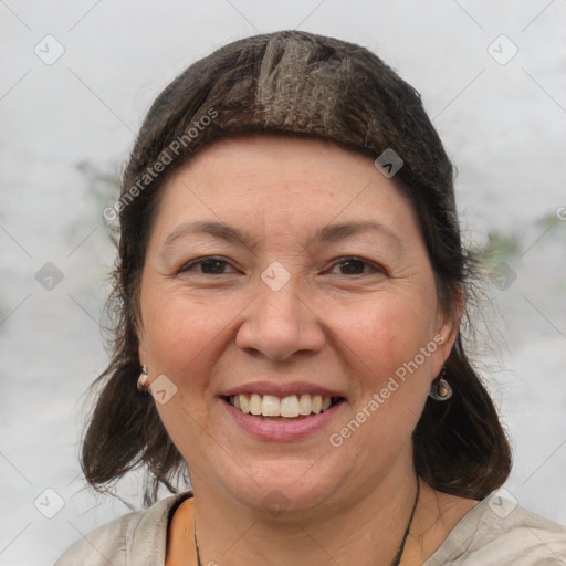 Joyful white adult female with medium  brown hair and brown eyes