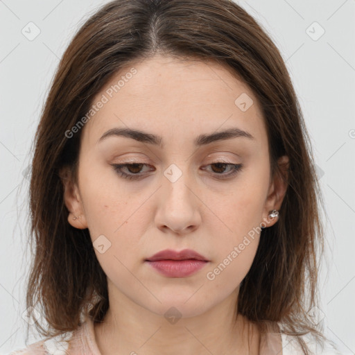 Neutral white young-adult female with long  brown hair and brown eyes