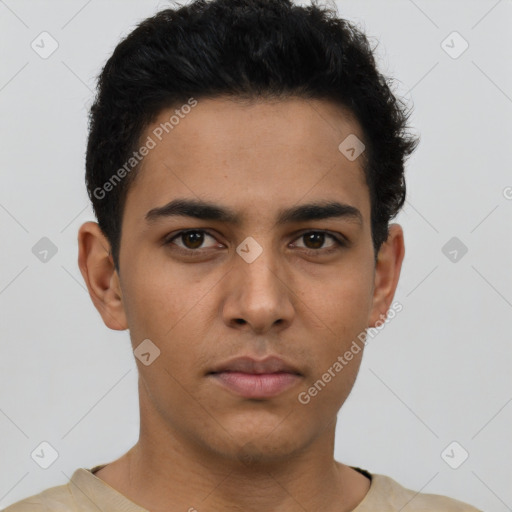 Neutral latino young-adult male with short  black hair and brown eyes