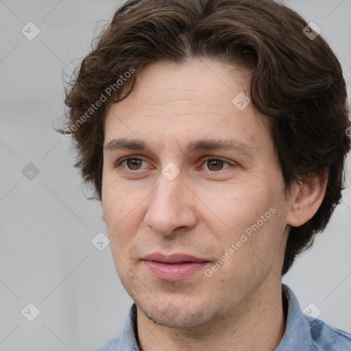 Joyful white adult male with short  brown hair and grey eyes