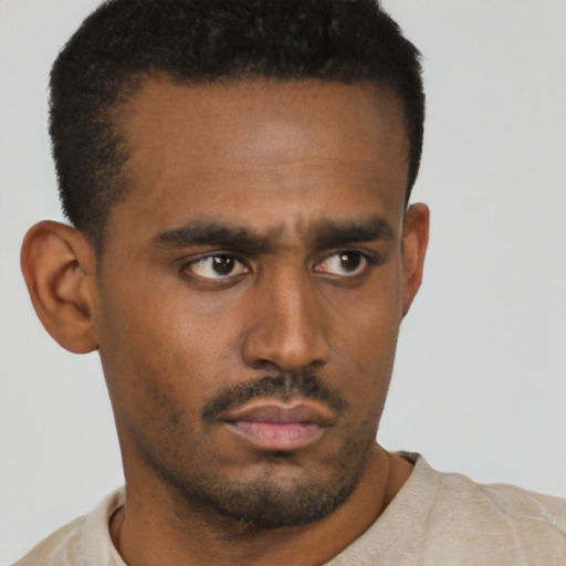 Neutral black young-adult male with short  black hair and brown eyes