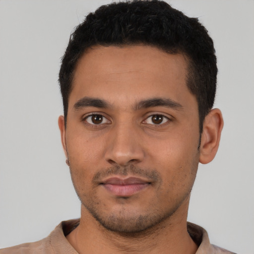 Neutral latino young-adult male with short  black hair and brown eyes