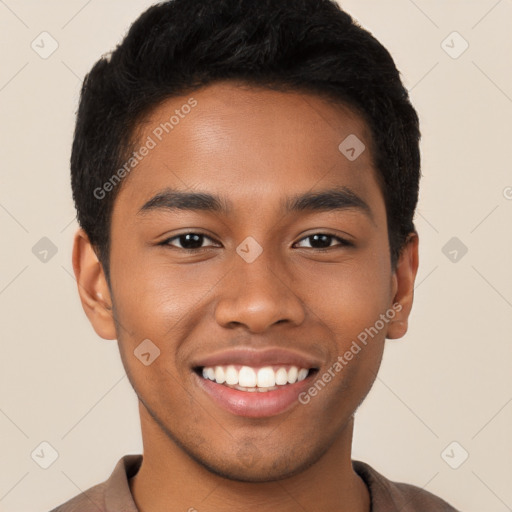 Joyful latino young-adult male with short  black hair and brown eyes